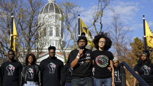 Jonathan Butler addresses students on Monday following the announcement that University of Missouri president Tim Wolfe would resign.