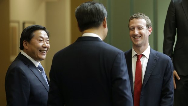 Chinese President Xi Jinping, centre, talks with Facebook CEO Mark Zuckerberg, right, as Lu Wei, left, China's internet czar at the Microsoft Redmond campus in 2015.
