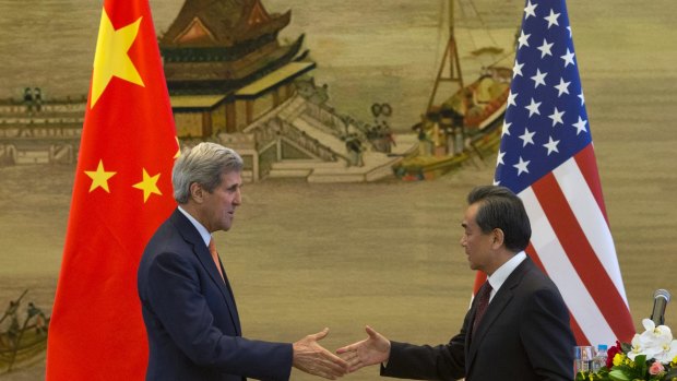 US Secretary of State John Kerry and Chinese Foreign Minister Wang Yi in Beijing on Saturday.