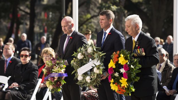 Opposition Leader, John Roberston (L), NSW Premier, Mike Baird (Centre), and state vice president of the Returned and Services League, Peter Stephenson, prepare to lay wreaths at the WWI Centenary Ceremony held at Hyde Park on August 4.