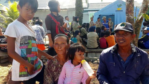 Former Gafatar members Supriyadi, right, his wife Nurul, their youngest daughter Dewi Suci and their son Waliandi.  