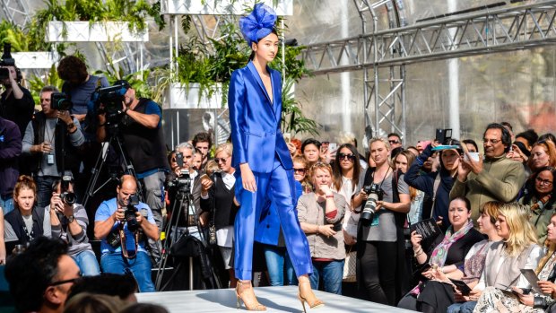The Carla Zampatti electric blue suit will turn heads at the races.