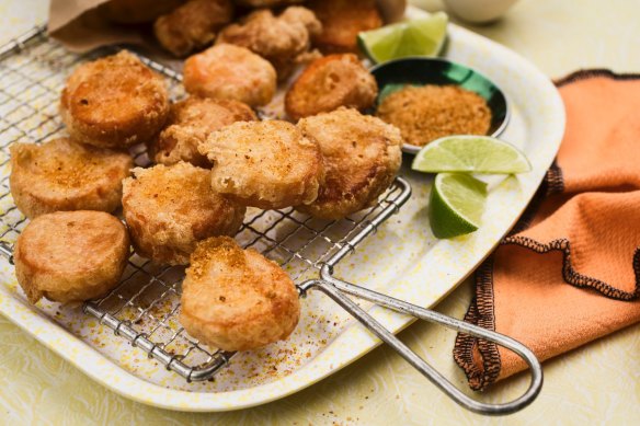 Little sweet potato fritters with chicken salt, lime and sour cream.