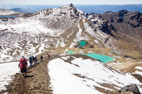 Tongariro Alpine Crossing: Almost universally described as New Zealand's best day walk, the Alpine Crossing is paradoxically colourful and bleak as it threads between the volcanoes of Tongariro National Park. 