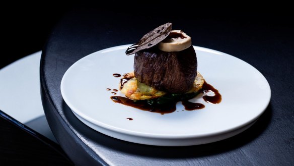Angus beef Rossini with foie gras parfait and truffle glaze.