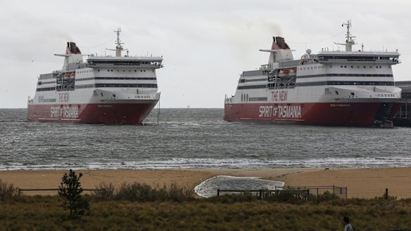 The Spirit of Tasmania I comes to the rescue of its sister ship, damaged in strong winds. 