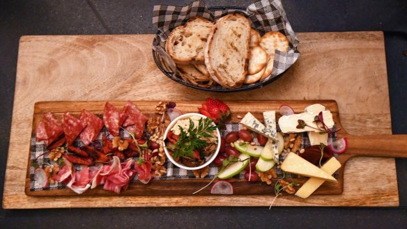 Cheese and charcuterie platters work well in the snug confines of the cottage.