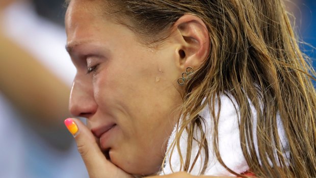 Russia's Yulia Efimova cries after placing second in the women's 100m breaststroke final. 