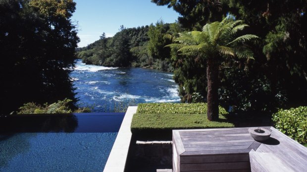 The Owner's Cottage infinity pool overlooks the Huka River.
