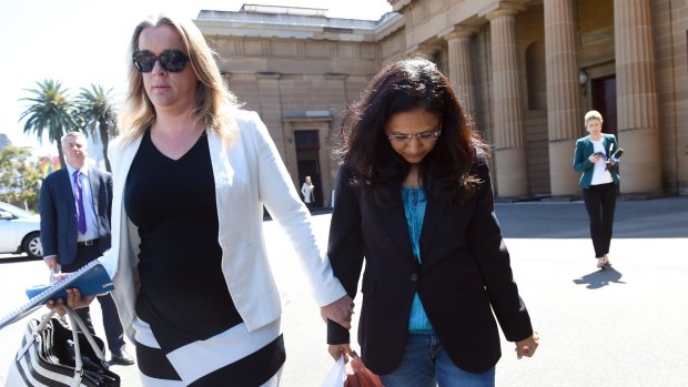 Viral Patel (right), the sister of Manisha Patel, leaves the NSW Supreme Court following sentencing in Sydney.