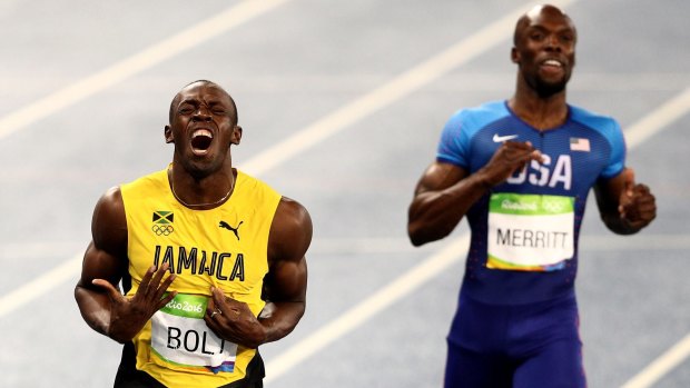 Winner: Usain Bolt celebrates after crossing the line.