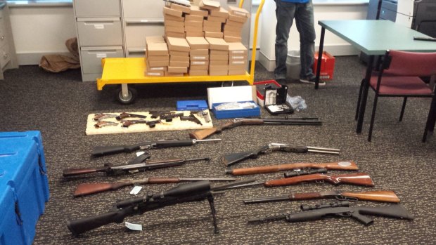 Some of the 126 illegal firearms allegedly imported by a Gold Coast man.
