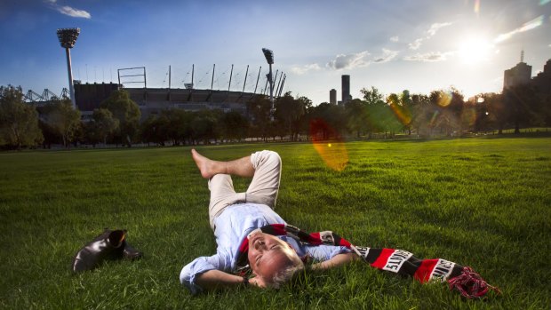 Andy May enjoys the last rays of light in Yarra Park with the famous MCG in the background.