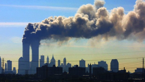 Smoke billows from the twin towers of the World Trade Center in New York after airplanes crashed into both towers on September 11, 2001.