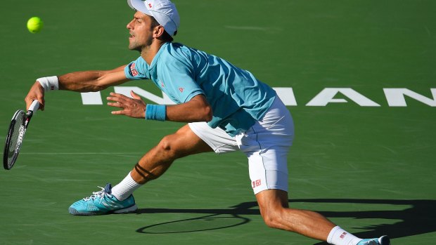 Stretched: Novak Djokovic was riding a 20-match winning streak at Indian Well.