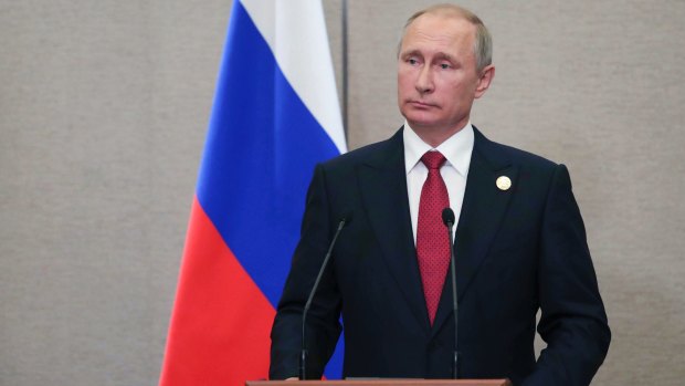 Russian President Vladimir Putin warned North Korea would not abandon its weapons program.