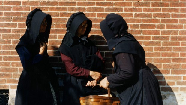 Married women among the Amish wear bonnets, full-length dresses and aprons. The Amish have maintained a conservative agricultural way of life, eschewing modern industrial society. 