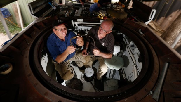 Joe Tabone  and Mike McGraw in the restored Matilda tank. 