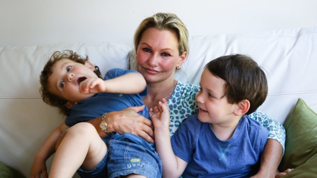 Danica Weeks, whose husband was on board MH370, with her children Lincoln and Jack.