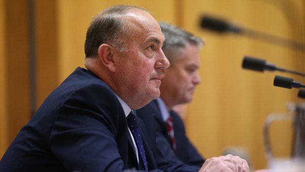 John Fraser Treasury Secretary before a Senate Committee at Parliament House in Canberra. 