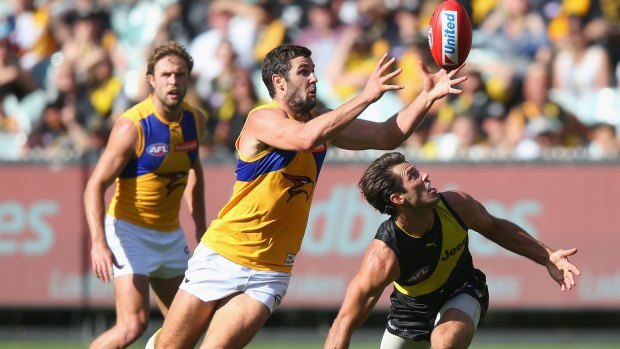 Eagle eye: Jack Darling competes with Alex Rance.
