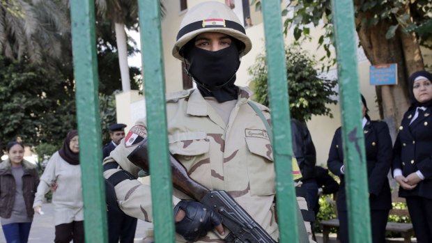 An Egyptian soldier stands guard in Cairo, Egypt.