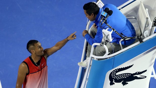 Ugly spat: Nick Kyrgios of Australia argues with the chair umpire during his third-round loss against Tomas Berdych.