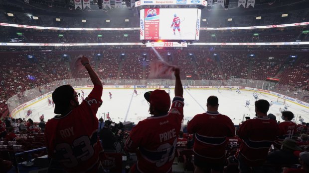 Montreal Canadiens fans cheer prior to Game 4 of the NHL hockey Stanley Cup Final against the Tampa Bay Lightning in Montreal in July. Ice hockey is fast, it's skilful and it's hardcore.
