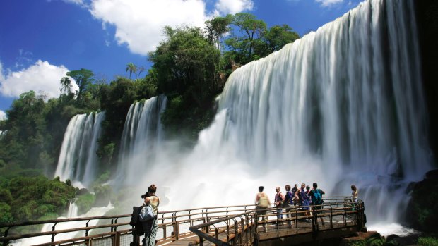 The specatcular waterfalls of Iguasu on the Argentina-Brazil border.)