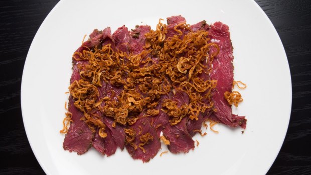 Kangaroo pastrami, cultured cream and crisp onions.