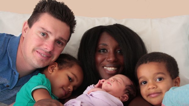 Matthew Green and Naomi Kissiedu-Green with their children Ebony, 2, newborn Savanna and Kobi, 4. 