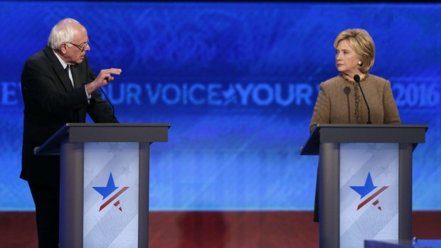 Hillary Clinton, right, with Bernie Sanders during Saturday's Democratic presidential primary debate.