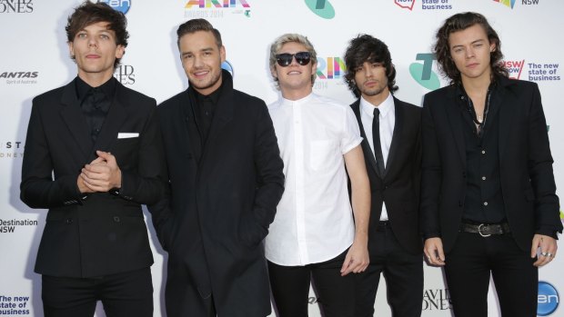 Zayn Malik (second from right) and Louis Tomlinson (left) with their One Direction bandmates at the 2014 ARIA Awards in Sydney. 