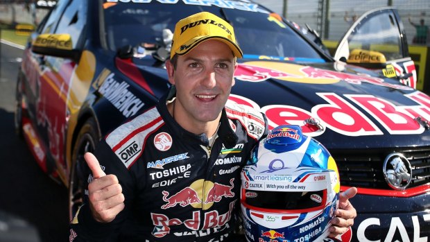 Winner: Jamie Whincup of Red Bull Racing Australia celebrates winning at Pukekohe Stadium on Sunday.