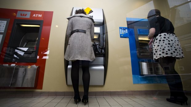 ATM withdrawals are dropping as consumers use cash less frequently.