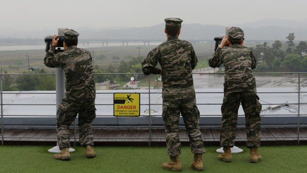South Korean marines look toward North Korea through binoculars at the Imjingak Pavilion near the border village of Panmunjom earlier this month.