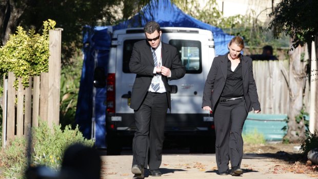 Detectives outside the Lin family's North Epping home after the five bodies were discovered
