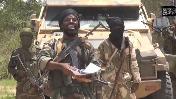 A still from a Boko Haram video shows the leader Abubakar Shekau, centre, who has voiced support for Islamic State militants.