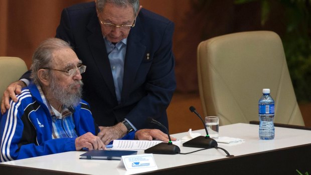 Cuba's President Raul Castro, right, embraces his brother Fidel at the 7th Cuban Communist Party Congress in Havana,  2016. 