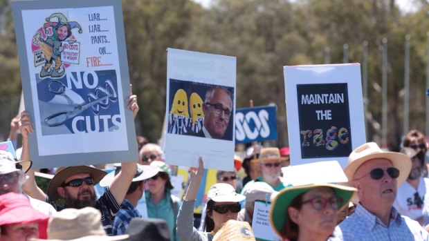 Protesters rally against ABC budget cuts outside Parliament House on Tuesday. 