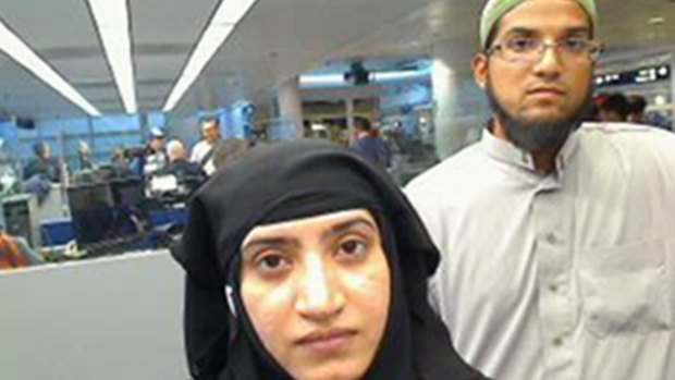 San Bernardino shooters Tashfeen Malik, left, and Syed Farook, as they passed through O'Hare International Airport in Chicago in 2014.