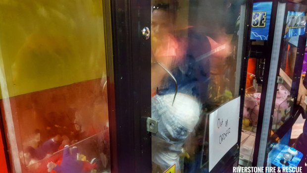 The boy was rescued from inside the vending machine. 