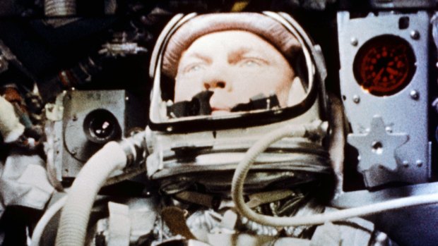 John Glenn pilots the "Friendship 7" Mercury spacecraft during his historic flight as the first American to orbit the Earth. 
