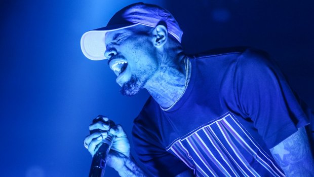 Chris Brown performs at a concert in Los Angeles.