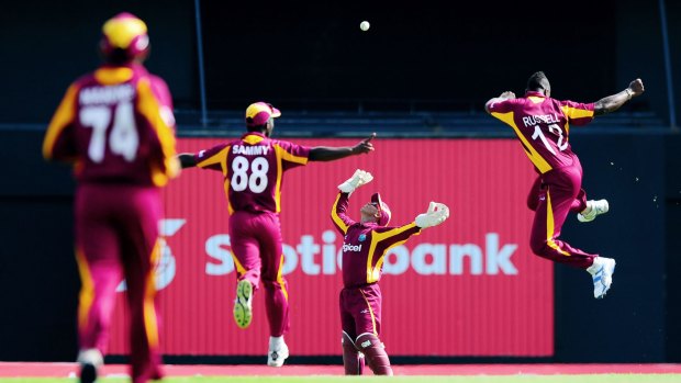 Get your kicks: Andre Russell celebrates a wicket against Australia in St Lucia in 2012.