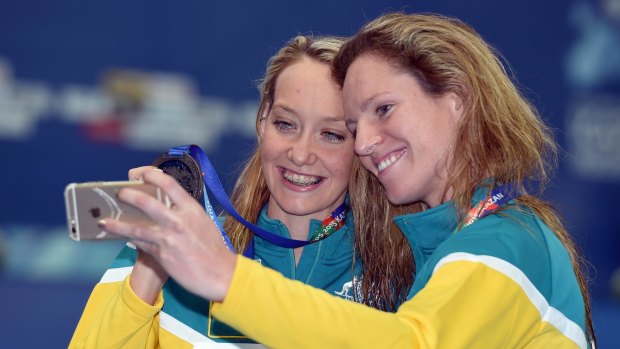 Sparkling selfie: Emily Seebohm (right) and Madison Wilson celebrate their medals.
