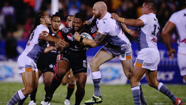 Man of the moment: Warrior Manu Vatuvei on the charge.