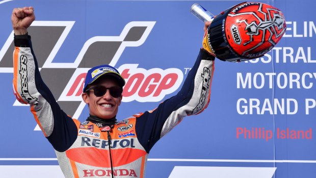 Winning ways: Spain's Marc Marquez celebrates on the podium after winning the Australian MotoGP at Phillip Island.