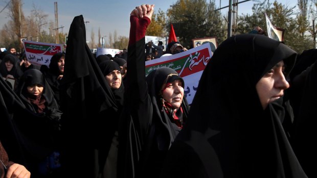 Iranian hard-liners have rallied to support the country's supreme leader and clerical-overseen government.