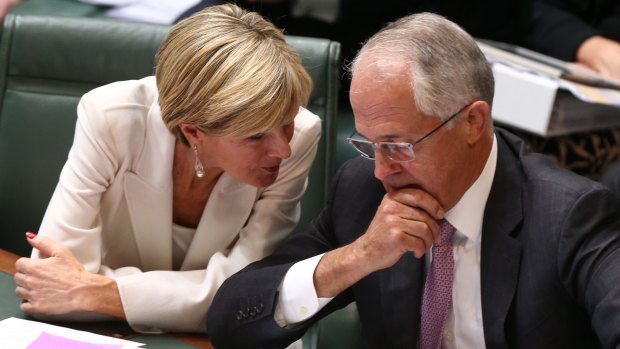 Foreign Affairs minister Julie Bishop and Prime Minister Malcolm Turnbull confer during question time on Monday.